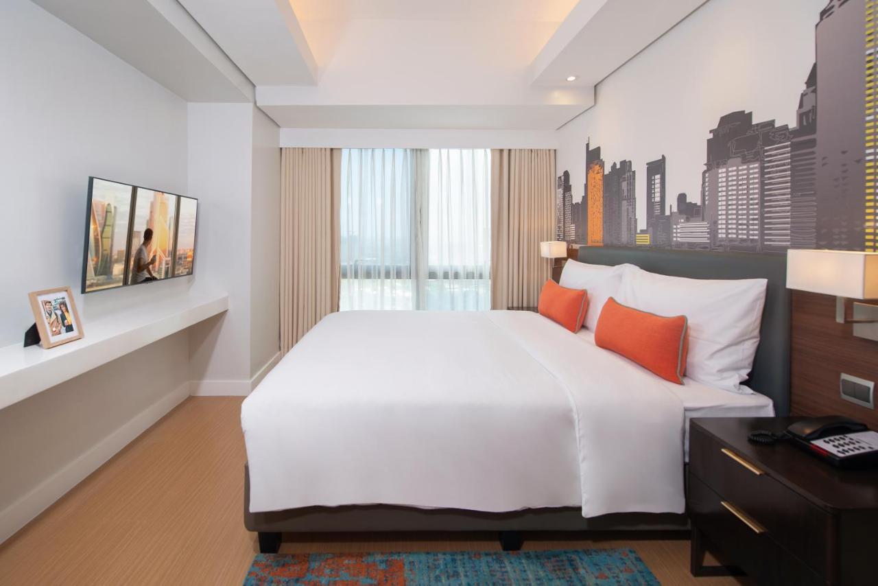 Отель Citadines Benavidez Makati Макати Экстерьер фото